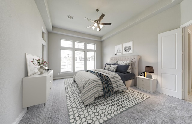 12611 Faded Sky Ct, Cypress, TX 77433 - carpeted bedroom featuring a ceiling fan and a tray ceiling