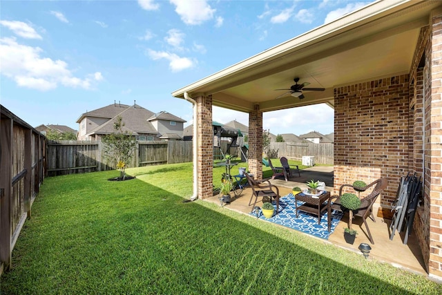 29903 Tallow Grove Ln, Brookshire, TX 77423 - fenced backyard featuring a ceiling fan, a patio, and a residential view