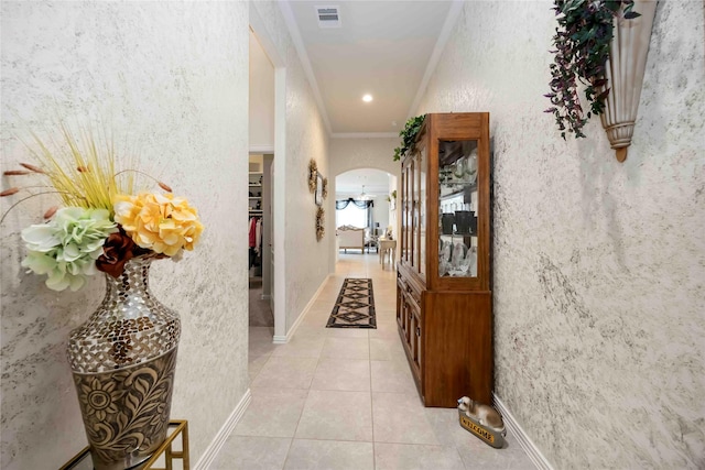 29903 Tallow Grove Ln, Brookshire, TX 77423 - hall featuring arched walkways, crown molding, and light tile patterned floors