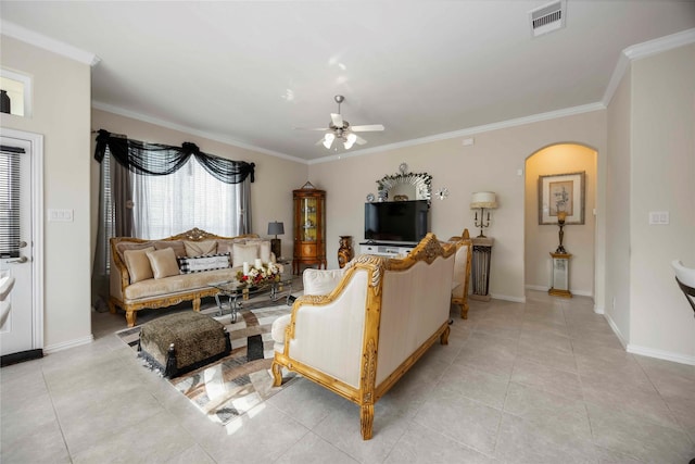 29903 Tallow Grove Ln, Brookshire, TX 77423 - living area featuring ceiling fan, arched walkways, ornamental molding, and light tile patterned floors