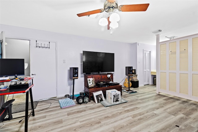 726 Park Knoll Ln, Katy, TX 77450 - living area featuring wood finished floors, a ceiling fan, and an office area