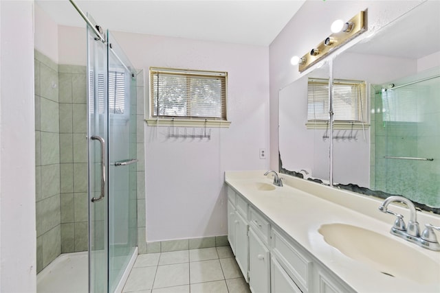 726 Park Knoll Ln, Katy, TX 77450 - bathroom with tile patterned floors, double vanity, and a shower stall