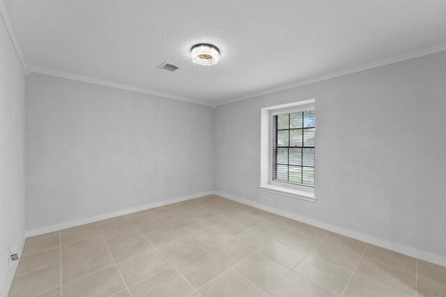 12611 Old River Dr, Baytown, TX 77523 - spare room featuring crown molding and a textured ceiling