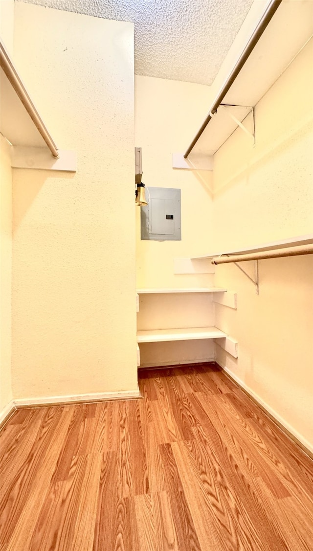 7900 N Stadium Dr Unit 53, Houston, TX 77030 - walk in closet featuring electric panel and wood finished floors