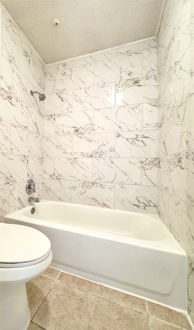7900 N Stadium Dr Unit 53, Houston, TX 77030 - bathroom with a textured ceiling and shower / bathtub combination