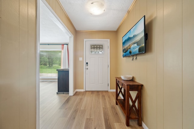 5254 State Highway 146 S, Livingston, TX 77351 - foyer entrance featuring light wood-style flooring and a textured ceiling