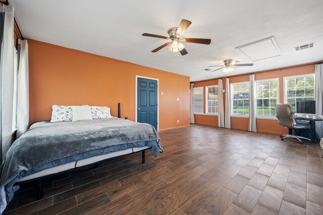 5254 State Highway 146 S, Livingston, TX 77351 - bedroom featuring attic access, wood finished floors, and an office area