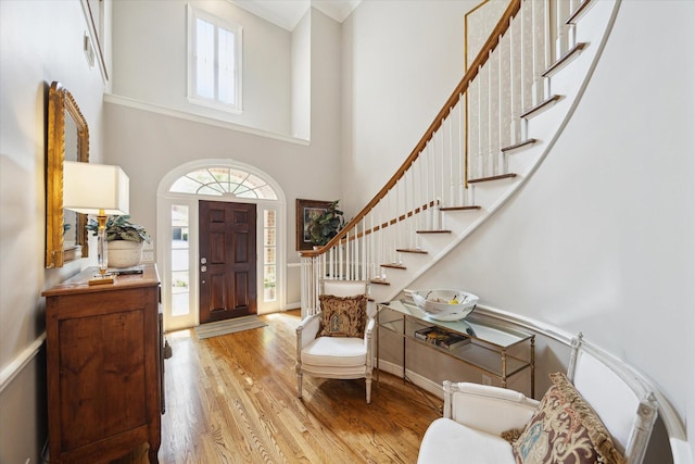333 Sugarberry Cir, Houston, TX 77024 - foyer entrance with wood finished floors, stairs, and a towering ceiling