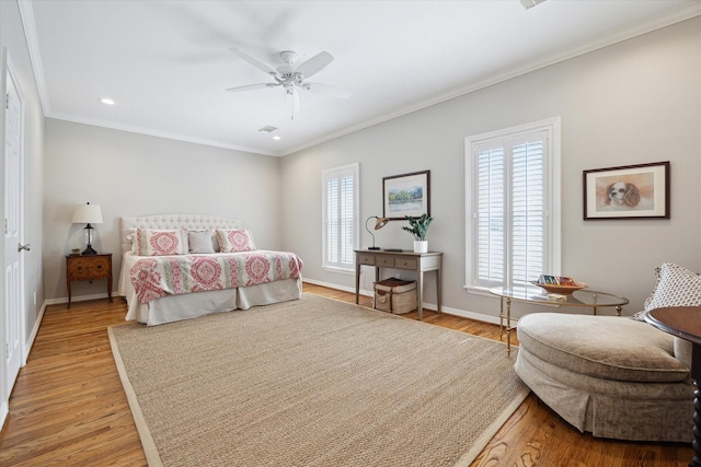 333 Sugarberry Cir, Houston, TX 77024 - bedroom with light wood-type flooring, crown molding, recessed lighting, and ceiling fan