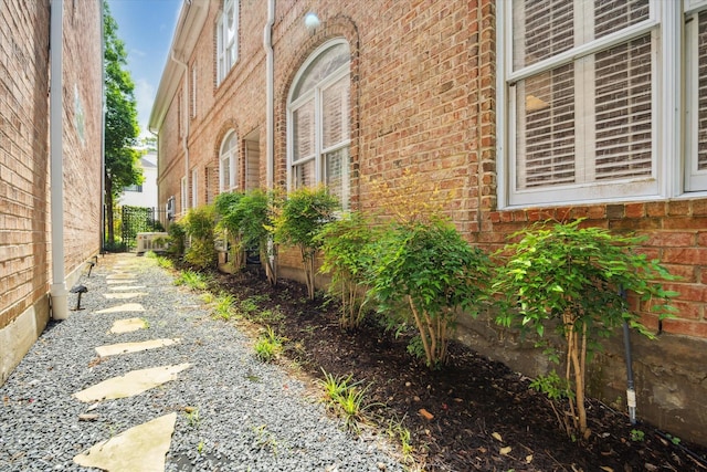 333 Sugarberry Cir, Houston, TX 77024 - view of home's exterior featuring brick siding