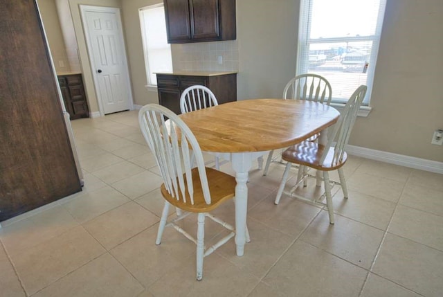 2028 County Road 201, Sargent, TX 77414 - dining room featuring light tile patterned floors and plenty of natural light