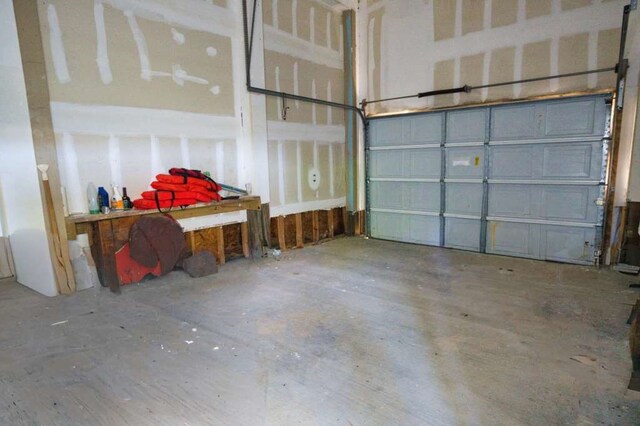 2028 County Road 201, Sargent, TX 77414 - garage with a workshop area