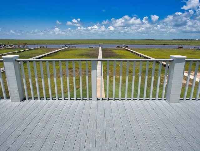 2028 County Road 201, Sargent, TX 77414 - wooden deck featuring a lawn