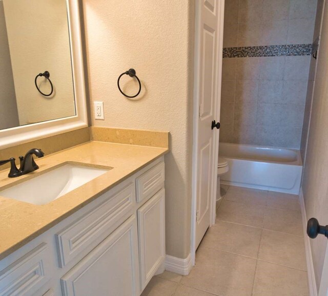 2028 County Road 201, Sargent, TX 77414 - full bath with vanity, tile patterned floors, tub / shower combination, and a textured wall