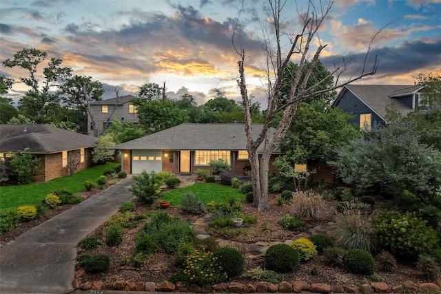 2114 Saxon Dr, Houston, TX 77018 - view of front of house with concrete driveway and brick siding
