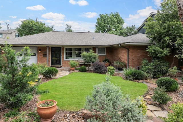 2114 Saxon Dr, Houston, TX 77018 - view of front of home featuring brick siding, a front yard, a shingled roof, and an attached garage