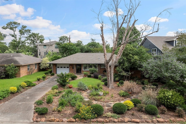 2114 Saxon Dr, Houston, TX 77018 - view of front of house featuring driveway, a front lawn, an attached garage, and brick siding