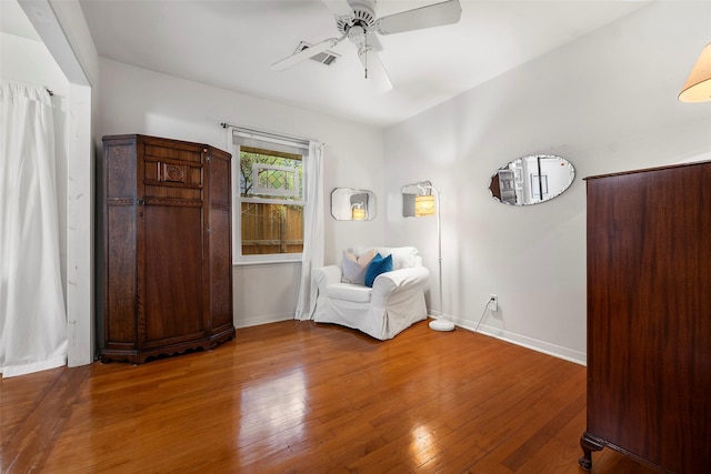 2114 Saxon Dr, Houston, TX 77018 - sitting room featuring a ceiling fan and hardwood / wood-style floors
