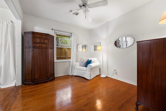 2114 Saxon Dr, Houston, TX 77018 - sitting room featuring a ceiling fan and hardwood / wood-style floors