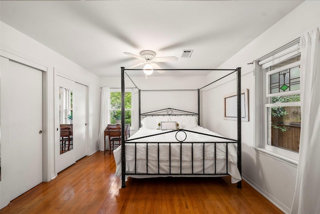 2114 Saxon Dr, Houston, TX 77018 - bedroom featuring hardwood / wood-style floors and a ceiling fan