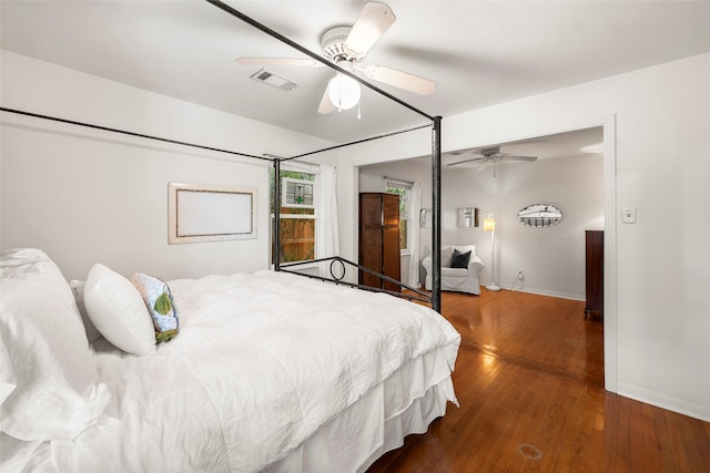 2114 Saxon Dr, Houston, TX 77018 - bedroom featuring hardwood / wood-style floors and a ceiling fan