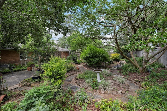 2114 Saxon Dr, Houston, TX 77018 - fenced backyard with a patio