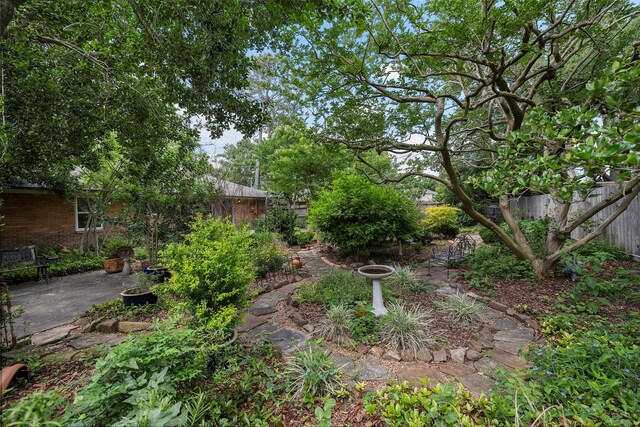 2114 Saxon Dr, Houston, TX 77018 - fenced backyard with a patio