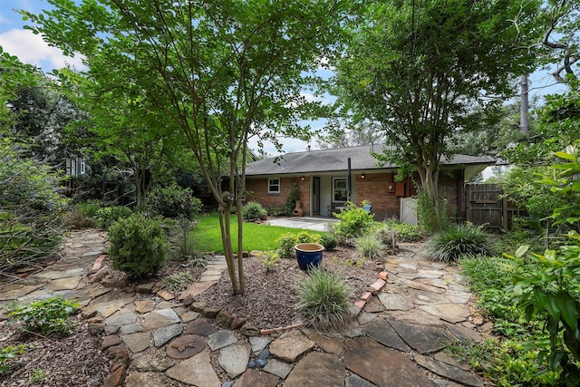 2114 Saxon Dr, Houston, TX 77018 - rear view of property featuring brick siding and a patio