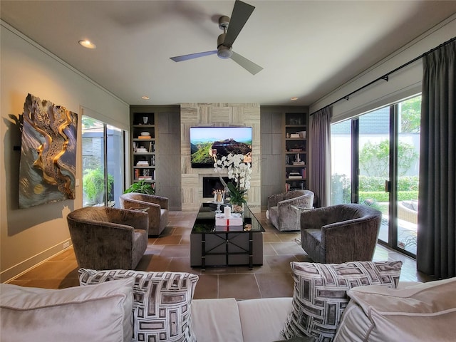 3124 Mid Ln, Houston, TX 77027 - tiled living area featuring built in shelves, ceiling fan, a fireplace, and recessed lighting