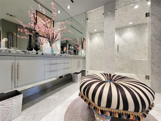 3124 Mid Ln, Houston, TX 77027 - full bath with double vanity, a shower stall, marble finish flooring, and recessed lighting