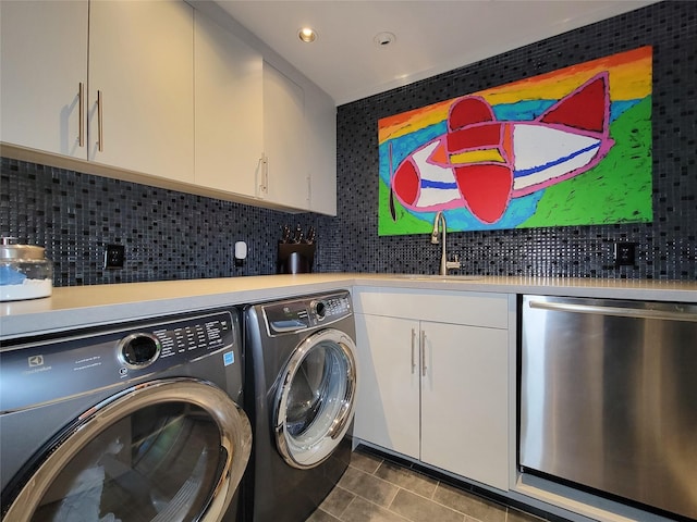 3124 Mid Ln, Houston, TX 77027 - washroom with tile patterned flooring, separate washer and dryer, and recessed lighting