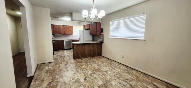 14027 Ambrose St, Houston, TX 77045 - kitchen featuring freestanding refrigerator, dishwasher, a chandelier, light countertops, and a peninsula