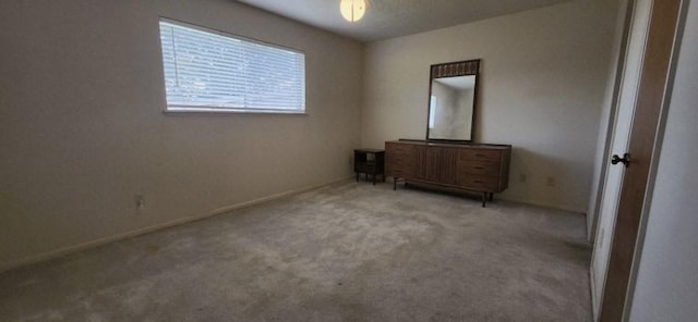 14027 Ambrose St, Houston, TX 77045 - unfurnished bedroom with carpet floors and baseboards