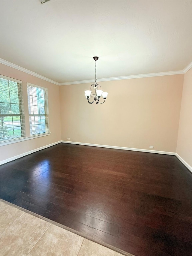 8231 Groveland Hills Dr, Cypress, TX 77433 - spare room featuring a chandelier, hardwood / wood-style floors, and crown molding