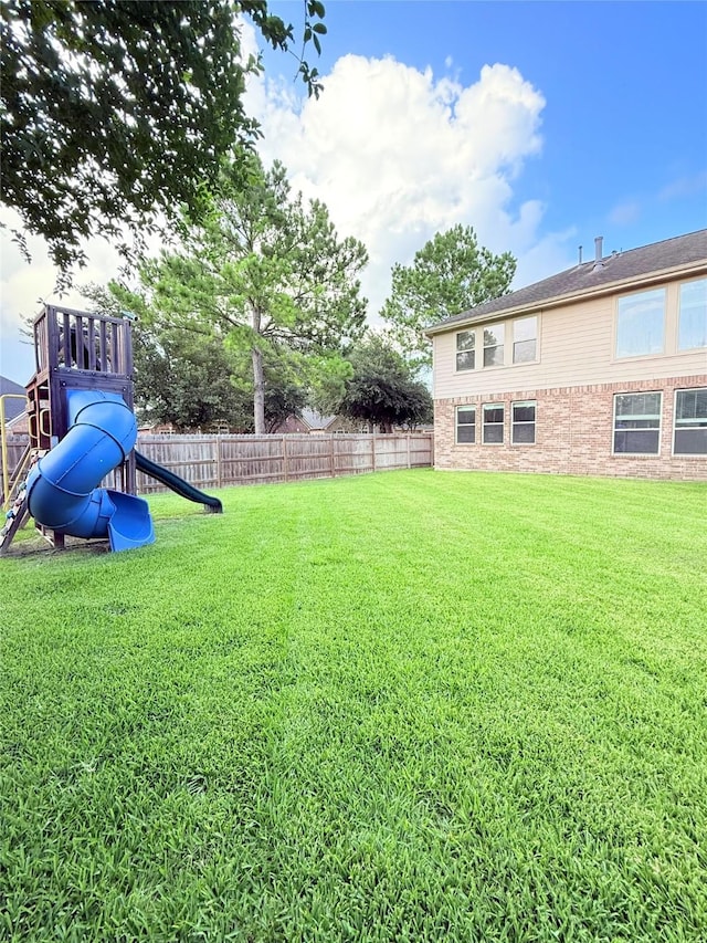 8231 Groveland Hills Dr, Cypress, TX 77433 - view of yard with a playground
