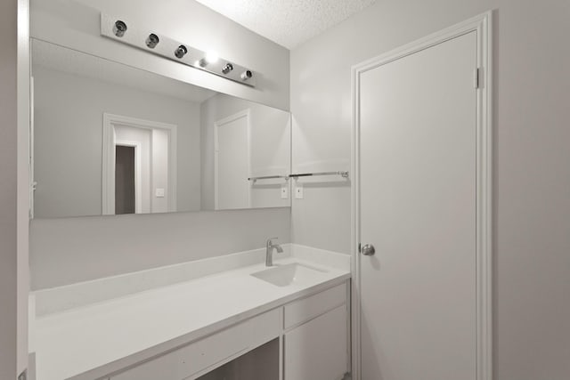 2212 Shadowdale Dr Unit 358, Houston, TX 77043 - bathroom featuring vanity and a textured ceiling