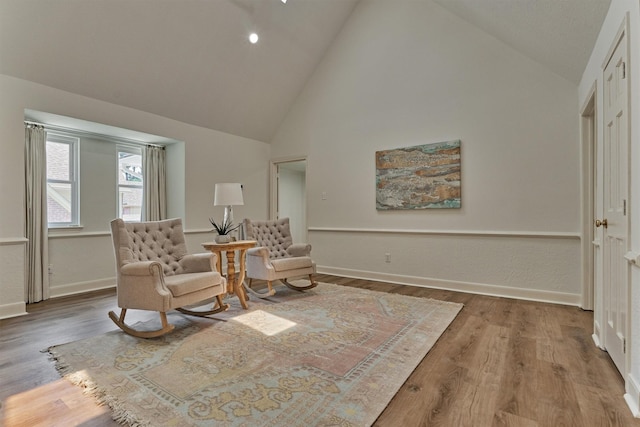 23119 Hampton Forest Ln, Spring, TX 77389 - sitting room with high vaulted ceiling and wood finished floors