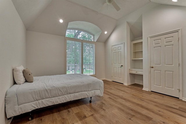 23119 Hampton Forest Ln, Spring, TX 77389 - bedroom featuring vaulted ceiling, multiple windows, light wood finished floors, recessed lighting, and a ceiling fan