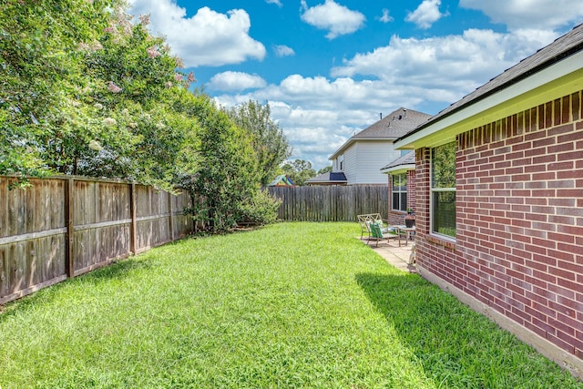 8114 Rushing Stream Ct, Tomball, TX 77375 - fenced backyard with a patio area