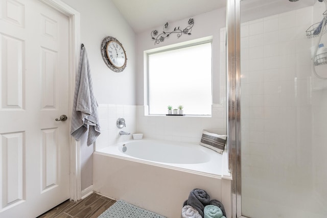8114 Rushing Stream Ct, Tomball, TX 77375 - full bathroom featuring a shower stall, a garden tub, and wood finished floors