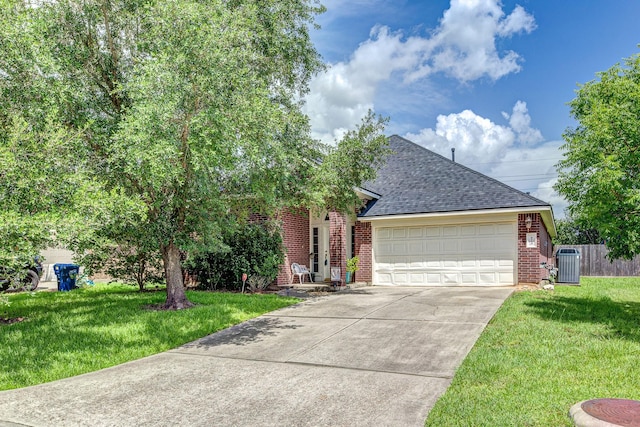 8114 Rushing Stream Ct, Tomball, TX 77375 - view of front of property with brick siding, a shingled roof, concrete driveway, and an attached garage