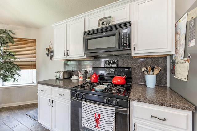 8114 Rushing Stream Ct, Tomball, TX 77375 - kitchen featuring black appliances, tasteful backsplash, white cabinets, and dark countertops