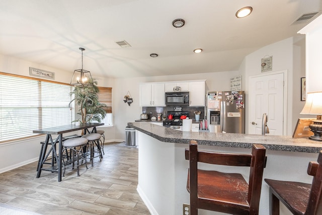 8114 Rushing Stream Ct, Tomball, TX 77375 - kitchen featuring black microwave, stainless steel refrigerator with ice dispenser, stove, white cabinets, and tasteful backsplash