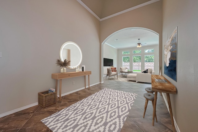 3631 Rocky Ledge Ln, Katy, TX 77494 - living area with crown molding, arched walkways, and ceiling fan