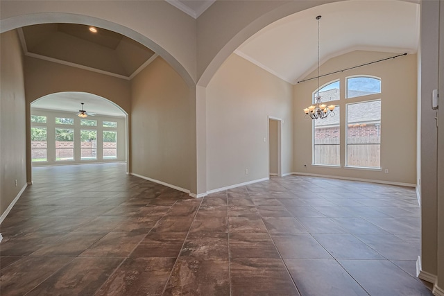 3631 Rocky Ledge Ln, Katy, TX 77494 - spare room featuring ceiling fan, a chandelier, lofted ceiling, and arched walkways