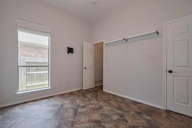 3631 Rocky Ledge Ln, Katy, TX 77494 - spare room featuring baseboards
