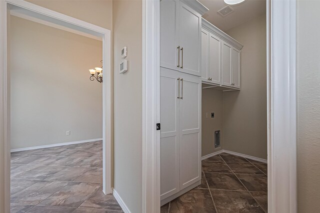 3631 Rocky Ledge Ln, Katy, TX 77494 - washroom with hookup for an electric dryer and a chandelier