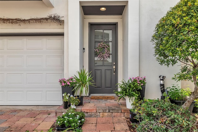 2206 Hilshire Glen Ct, Houston, TX 77080 - entrance to property featuring stucco siding and a garage