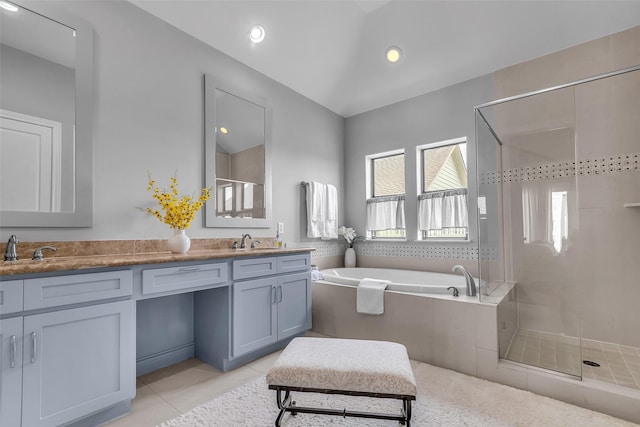 2206 Hilshire Glen Ct, Houston, TX 77080 - bathroom featuring double vanity, a shower stall, a bath, tile patterned flooring, and recessed lighting
