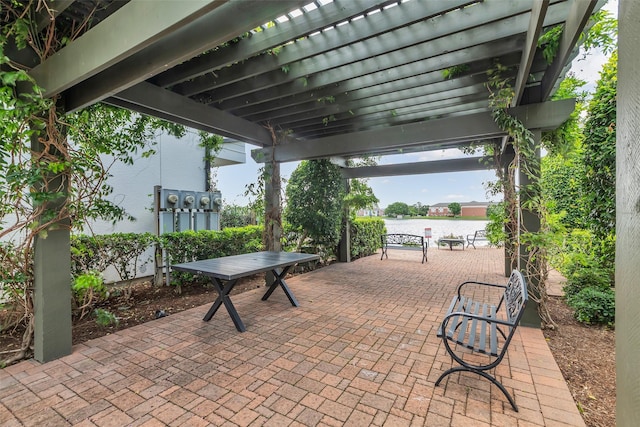 2206 Hilshire Glen Ct, Houston, TX 77080 - view of patio / terrace featuring a water view and outdoor dining area